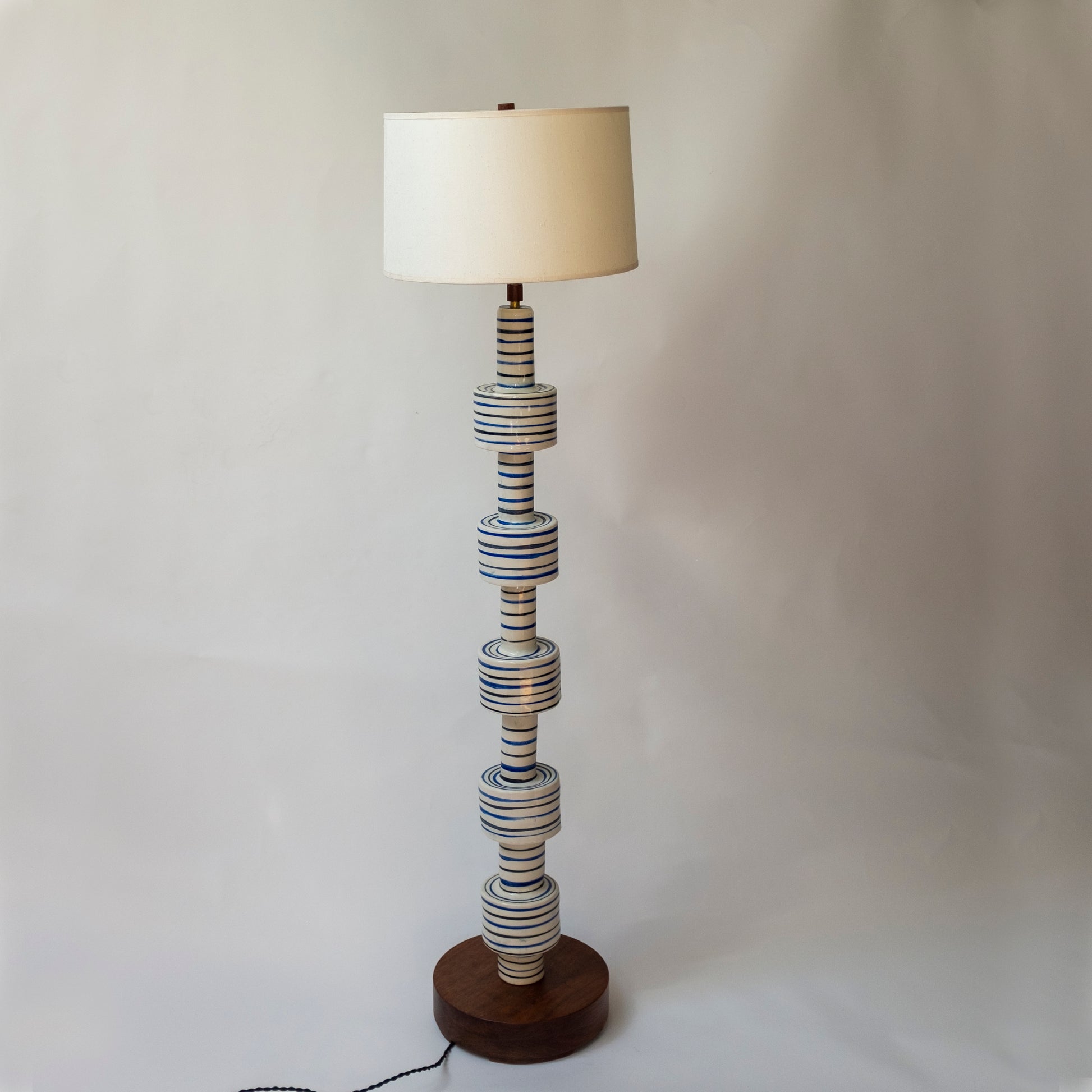 Striped White, Blue, and Black Floor Lamp.  Handmade with a solid walnut base.