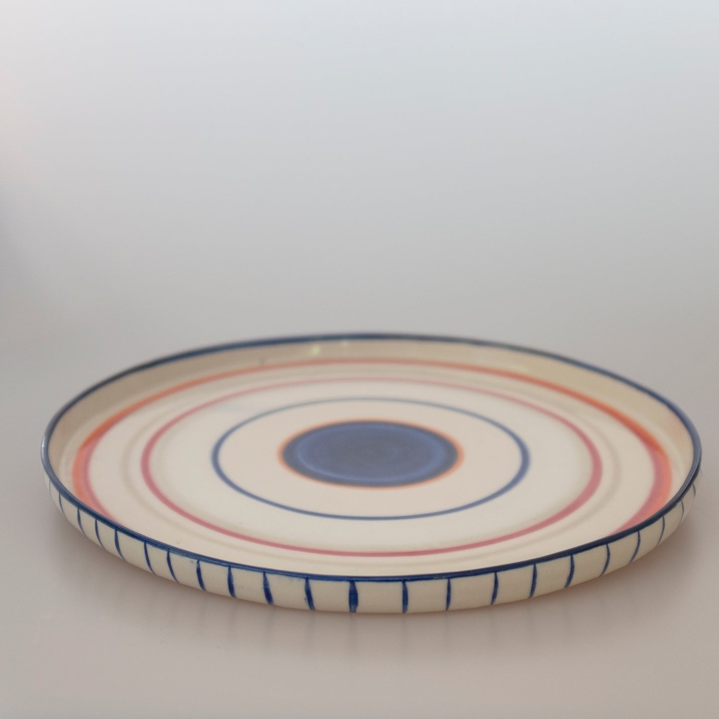 Circle Pop Platter - rust designs